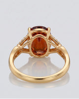 Luxury oval orange garnet ring with diamond accents in 18K yellow gold - SARATTI