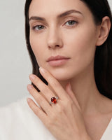 Luxury oval orange garnet ring with diamond accents in platinum - SARATTI