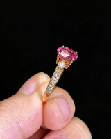 Luxury oval purple sapphire ring with graduated diamond band detailing in 18K yellow gold - SARATTI