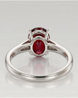 Luxury oval red garnet ring with diamond accents in 18K white gold | SARATTI