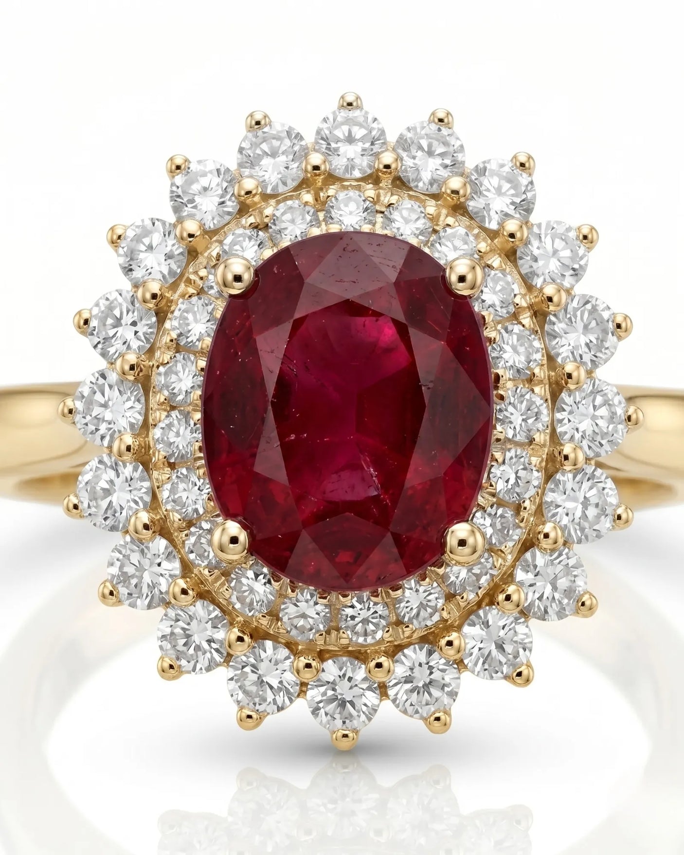 Classic ruby ring with round diamond halo and floral design in yellow gold | SARATTI.
