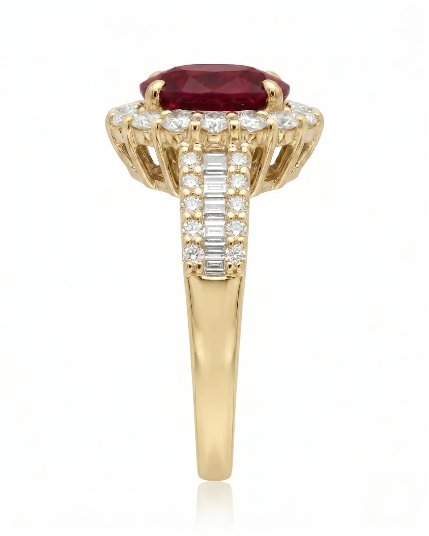 Luxury oval ruby halo ring with diamond shoulders in refined yellow gold | SARATTI