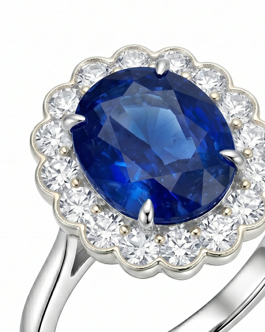 Luxury oval sapphire cocktail ring with diamond halo in platinum | SARATTI