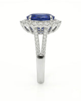 Luxury oval sapphire diamond halo ring crafted in polished 18K white gold - SARATTI