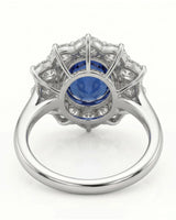 Luxury oval sapphire diamond halo ring crafted in polished 18K white gold SARATTI...
