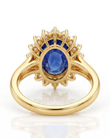 Luxury oval sapphire diamond promise ring crafted in rich 18K yellow gold | SARATTI