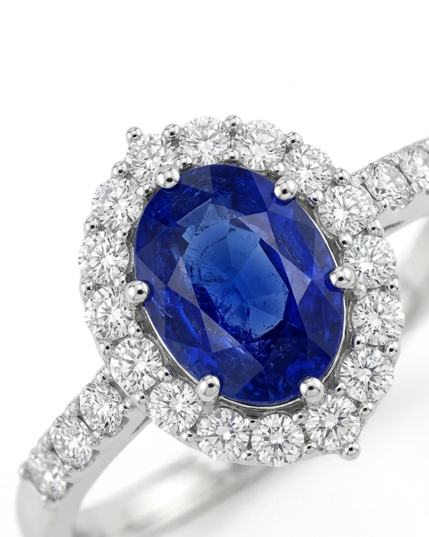 Luxury oval sapphire diamond ring with brilliant halo in 18K white gold | SARATTI