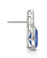 Luxury oval sapphire earrings with floral diamond detailing and polished 18K white gold craftsmanship | SARATTI