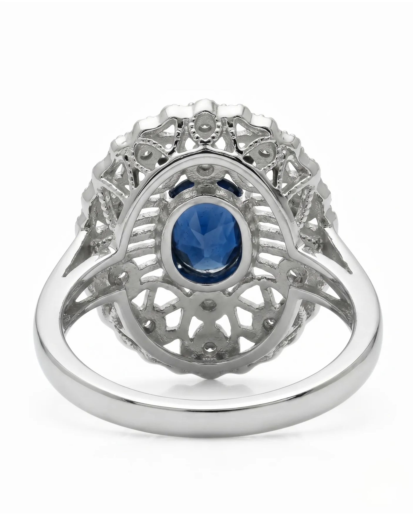 Luxury oval sapphire filigree ring with diamonds crafted in white gold | SARATTI