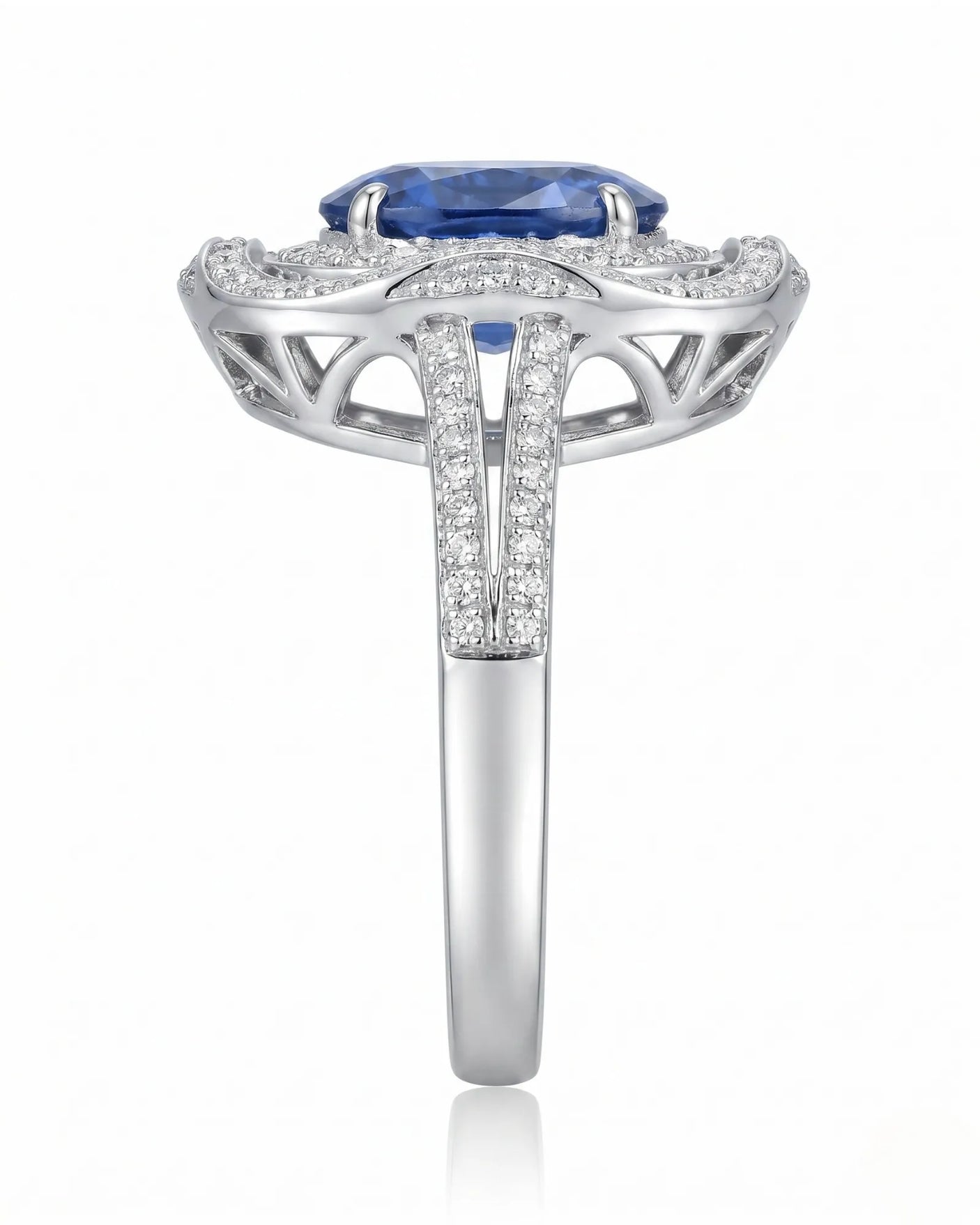 Luxury oval sapphire statement ring with diamond halo in platinum | SARATTI