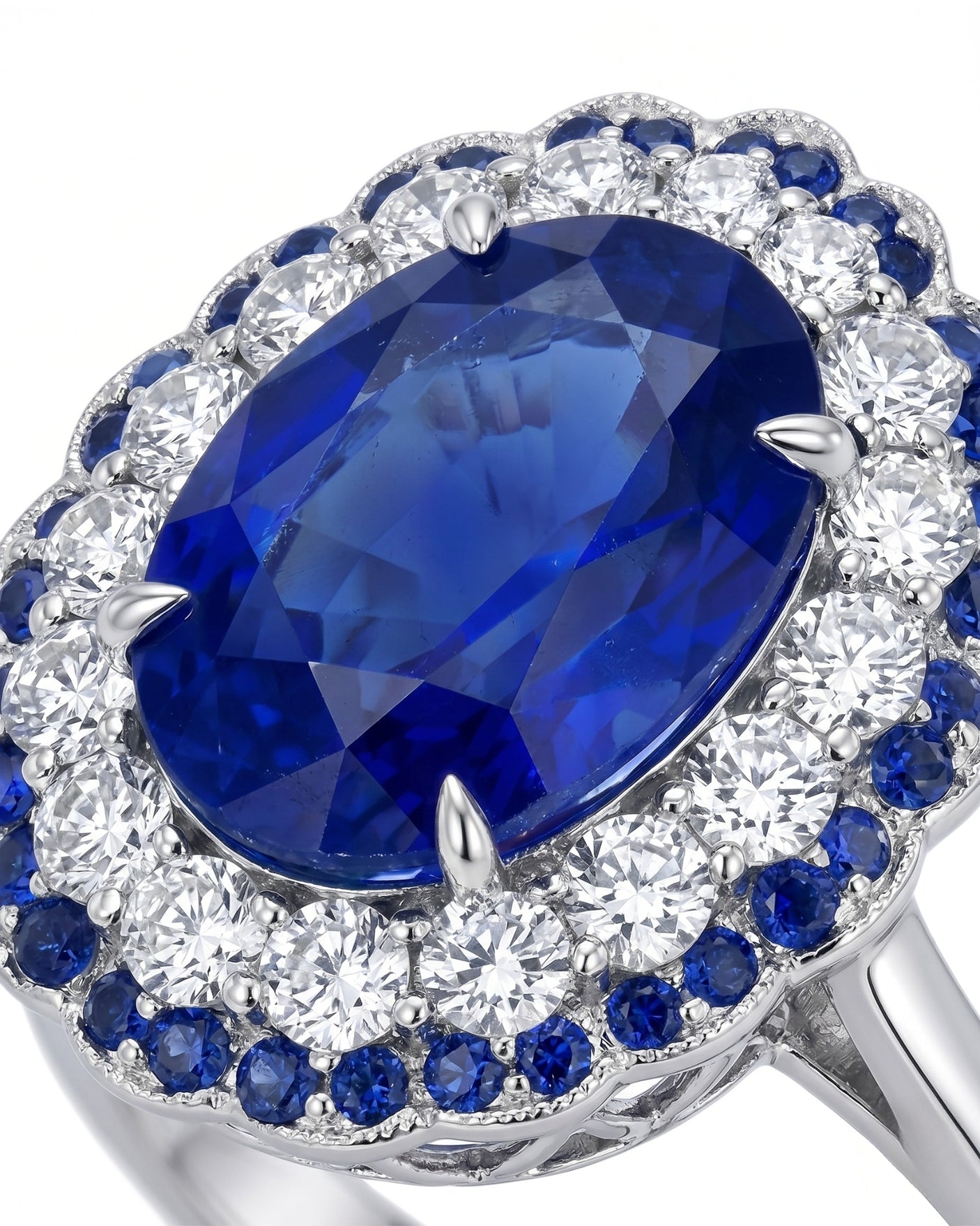Luxury oval sapphire statement ring with double halo design in 18K white gold - SARATTI