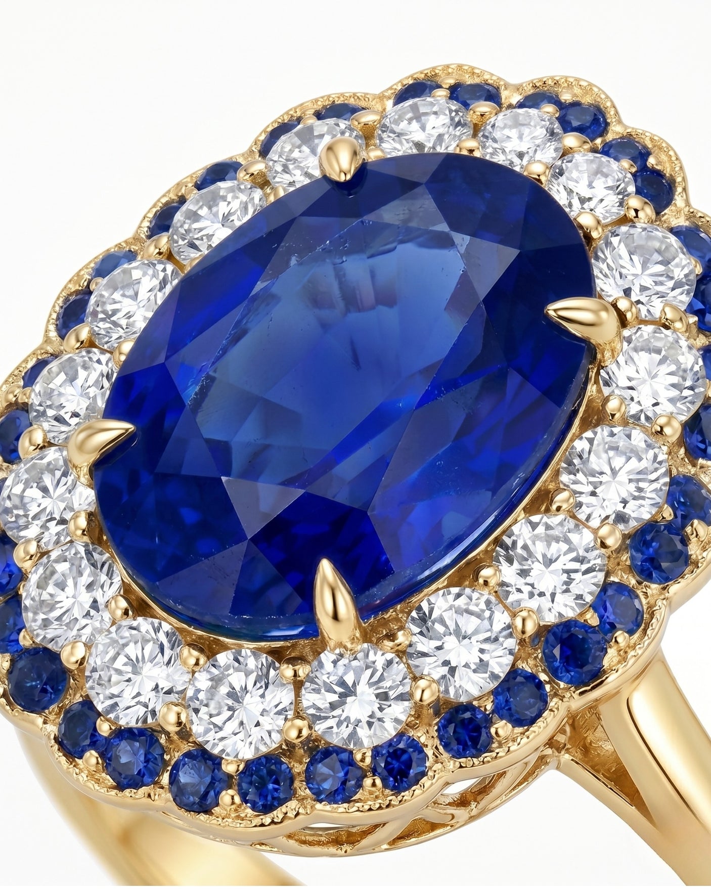 Luxury oval sapphire statement ring with double halo design in 18K yellow gold | SARATTI