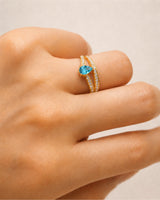 Luxury pear aquamarine ring with diamond split shank in 18K Yellow Gold | SARATTI