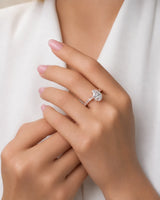 Luxury pear cut moissanite ring with detailed gallery and luminous accents in 18K rose gold | SARATTI