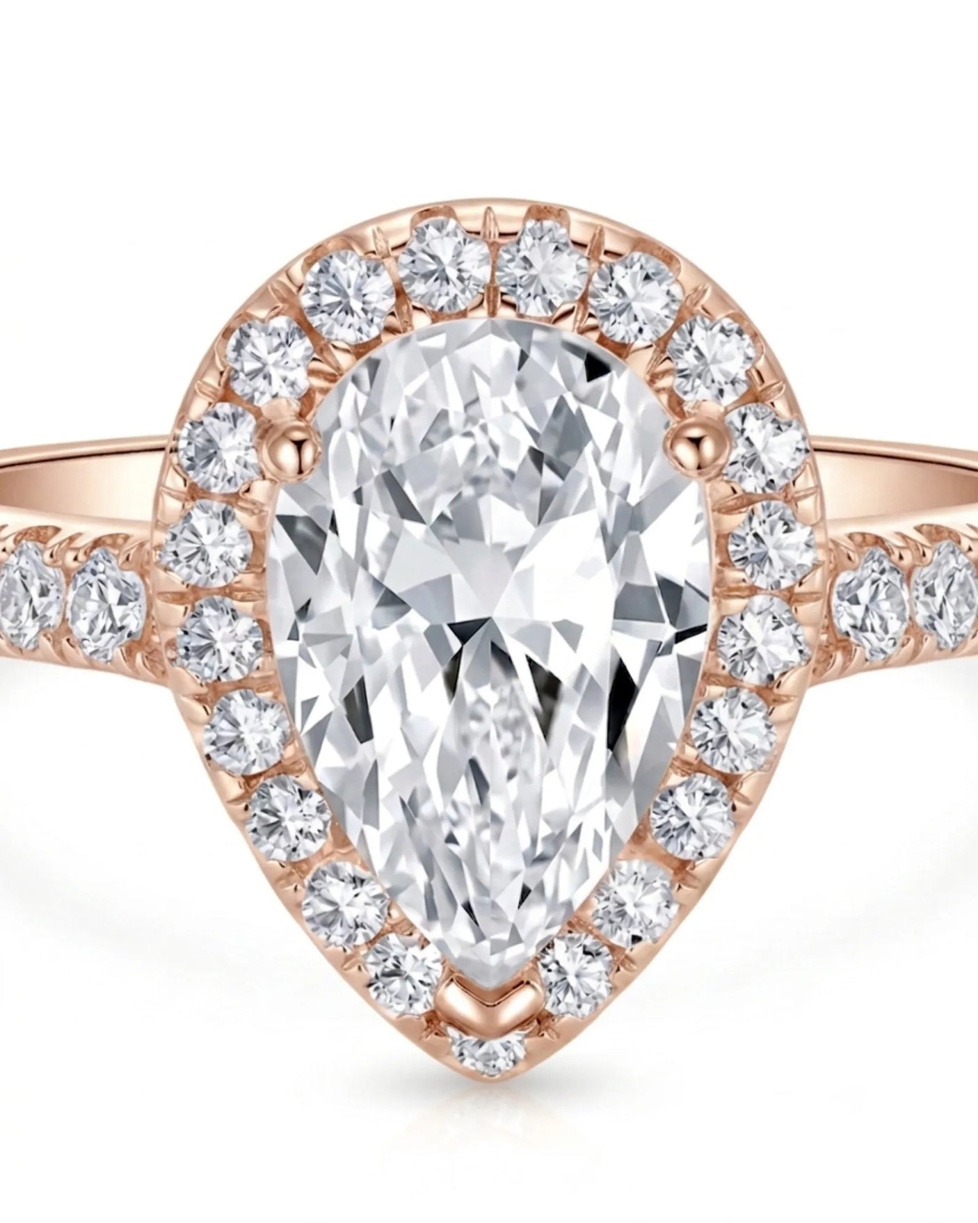 Luxury pear halo moissanite ring combining brilliant accents with warm rose gold elegance | SARATTI