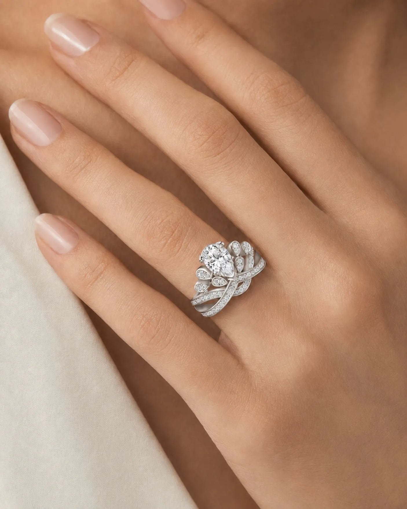 Luxury pear moissanite engagement ring with imperial detailing and enduring platinum craftsmanship - SARATTI