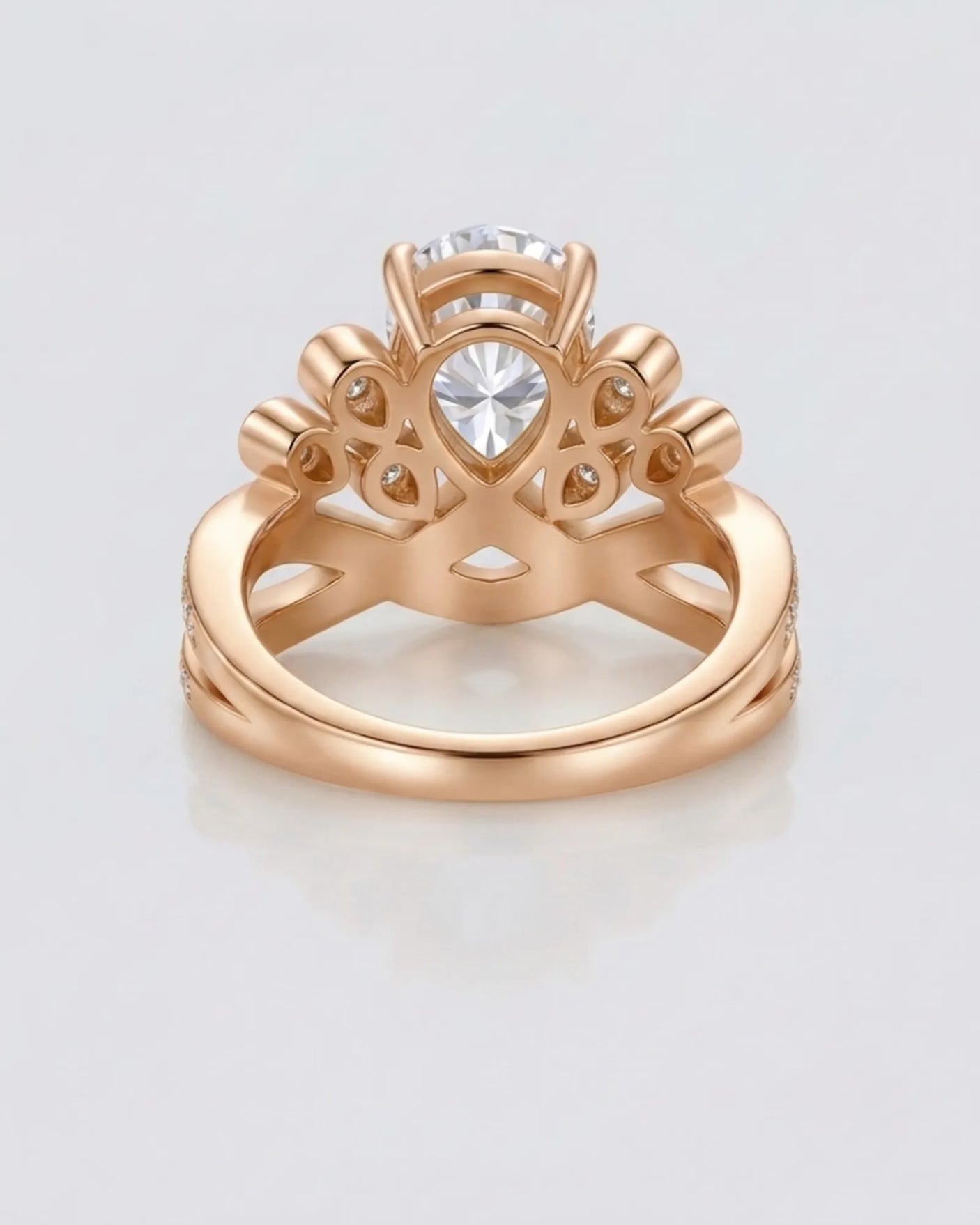Luxury pear moissanite engagement ring with imperial detailing and refined 18K rose gold craftsmanship - SARATTI