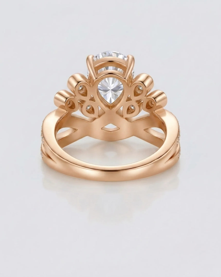 Luxury pear moissanite engagement ring with imperial detailing and refined 18K rose gold craftsmanship - SARATTI