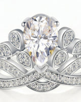 Luxury pear moissanite engagement ring with imperial detailing and refined 18K white gold craftsmanship | SARATTI