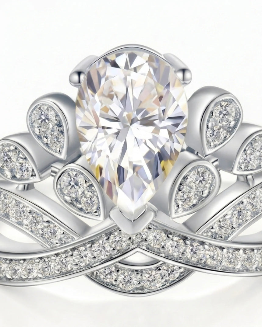 Luxury pear moissanite engagement ring with imperial detailing and refined 18K white gold craftsmanship | SARATTI