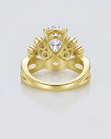 Luxury pear moissanite engagement ring with imperial detailing and rich 18K yellow gold craftsmanship -- SARATTI
