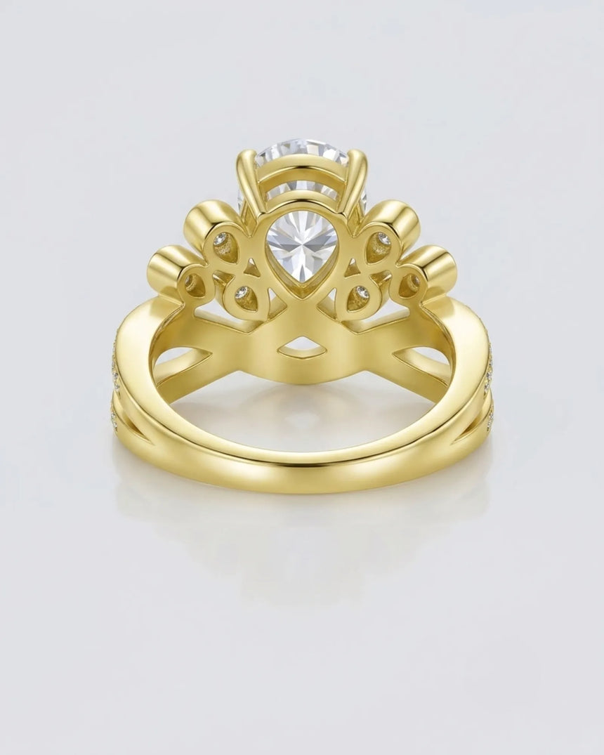 Luxury pear moissanite engagement ring with imperial detailing and rich 18K yellow gold craftsmanship -- SARATTI