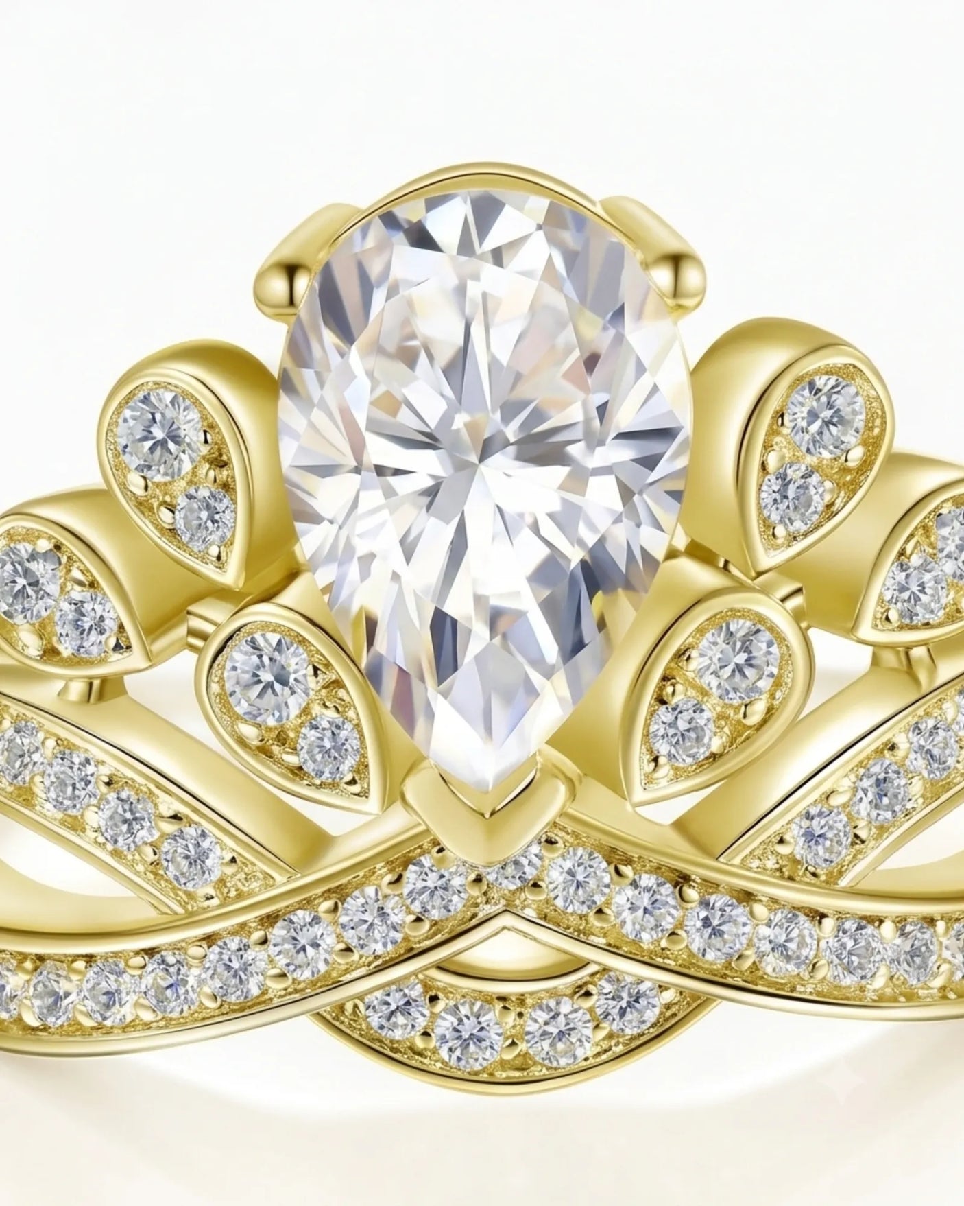 Luxury pear moissanite engagement ring with imperial detailing and rich 18K yellow gold craftsmanship - SARATTI
