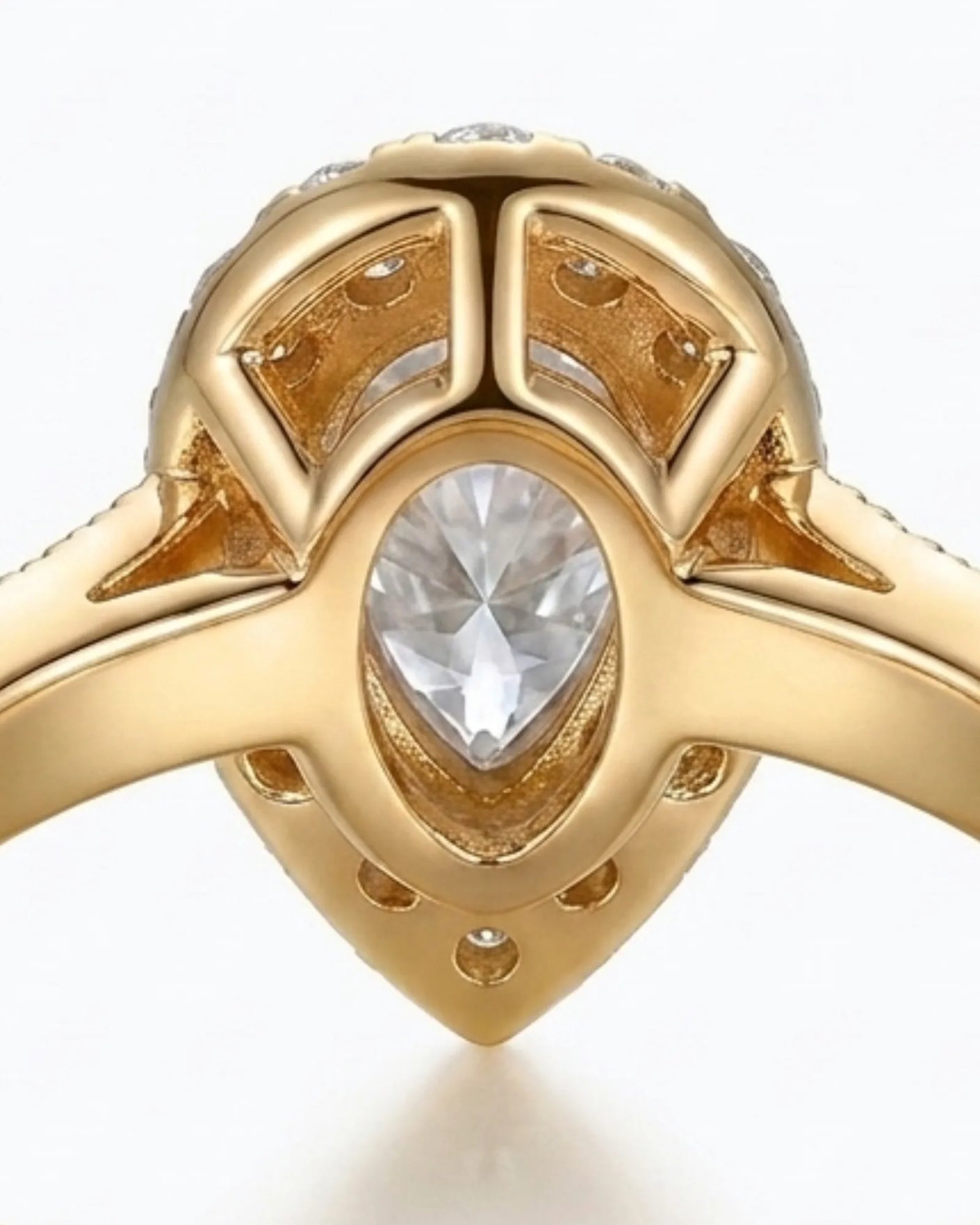 Luxury pear moissanite ring with halo, pavé band, and rich yellow gold setting - SARATTI