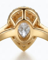 Luxury pear moissanite ring with halo, pavé band, and rich yellow gold setting - SARATTI
