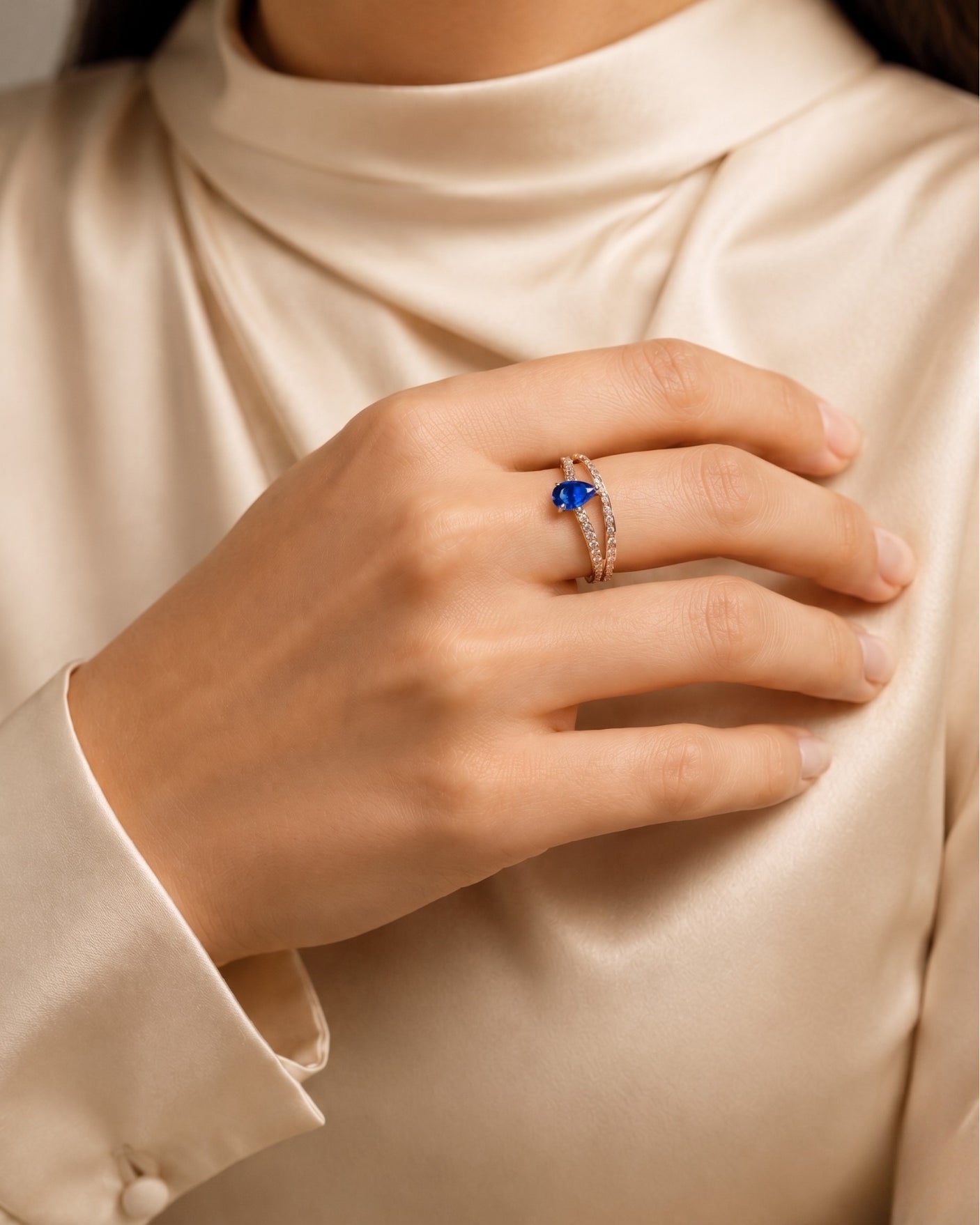 Luxury pear sapphire split shank ring with diamond accents in 18K rose gold | SARATTI