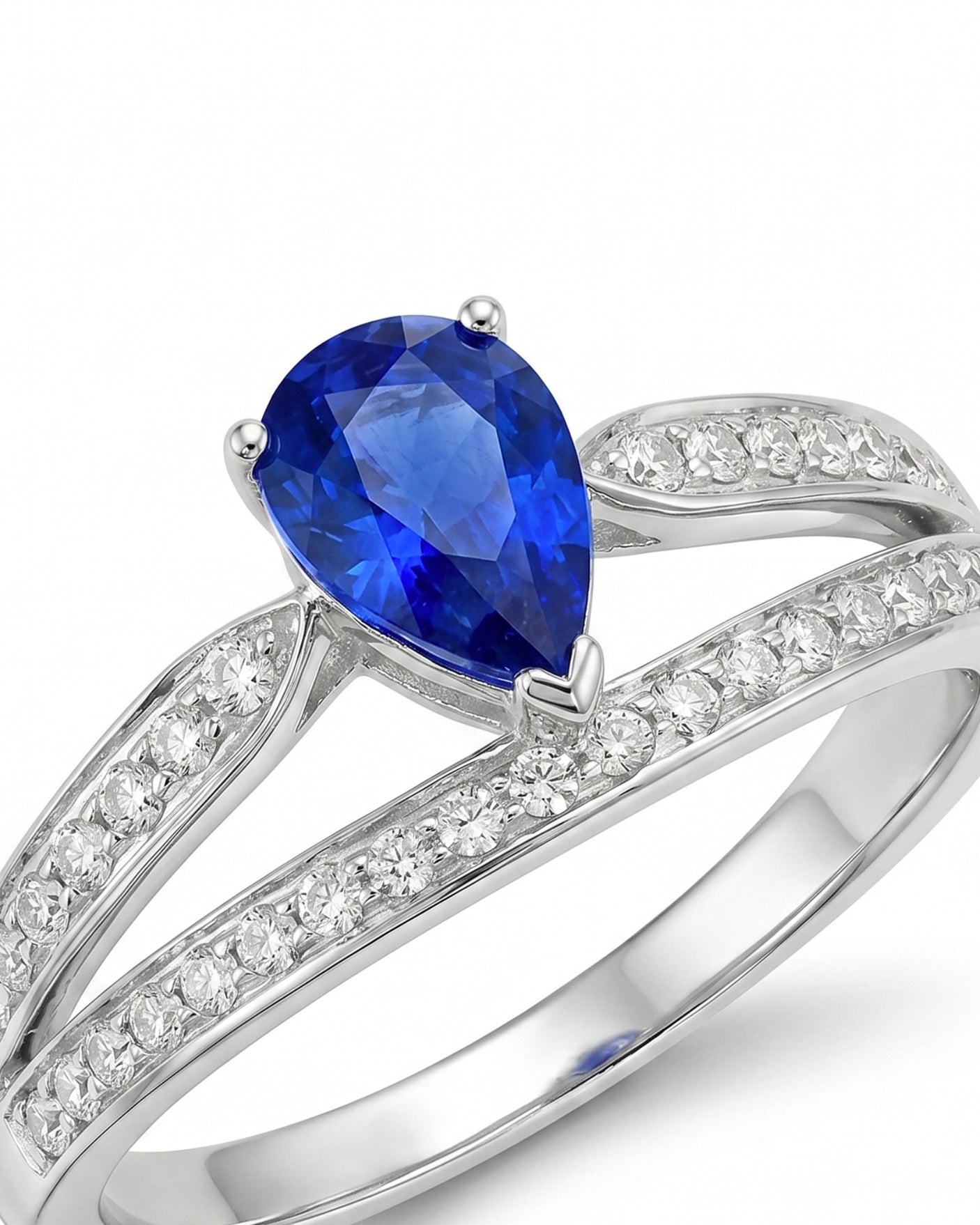 Luxury pear sapphire split shank ring with diamond accents in polished platinum | SARATTI