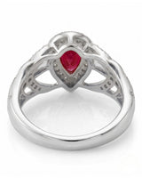 Luxury pear shaped ruby ring with diamonds in elegant platinum craftsmanship | SARATTI