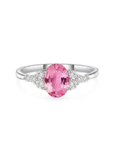 Luxury pink sapphire diamond ring with timeless oval design in platinum | SARATTI