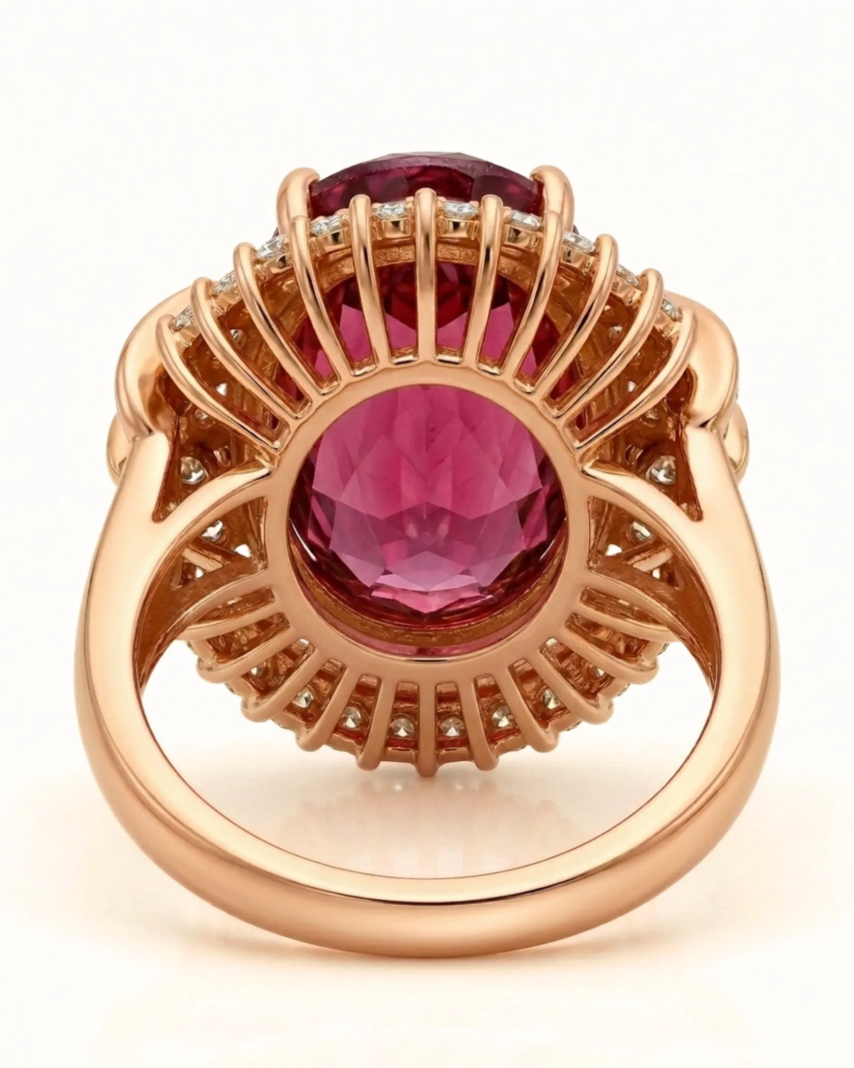 Luxury pink tourmaline and diamond ring in rose gold with sunburst halo design | SARATTI