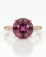 Luxury pink tourmaline ring with oval center stone in 18K rose gold | SARATTI