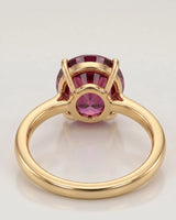 Luxury pink tourmaline ring with oval center stone in 18K yellow gold | SARATTI