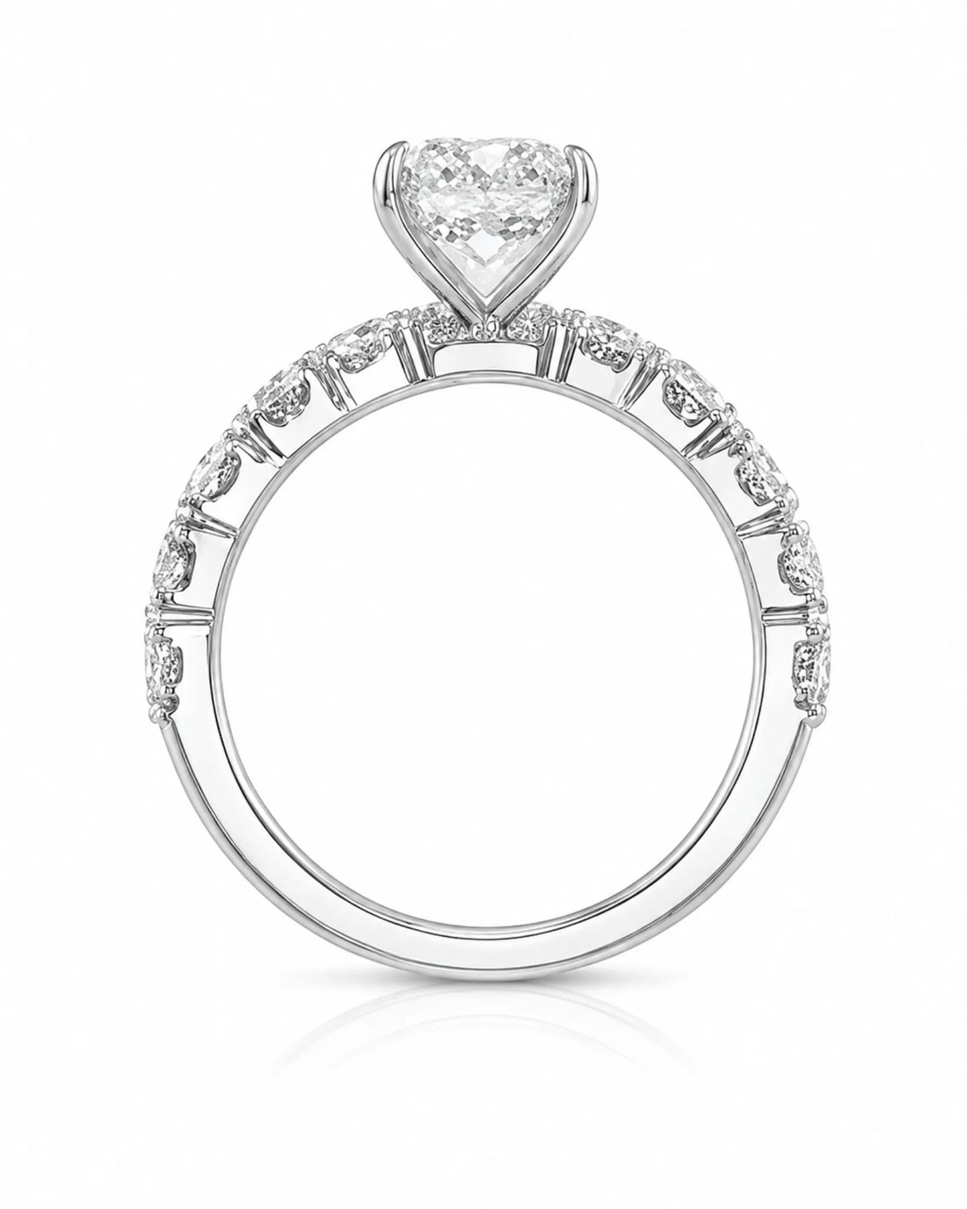 Luxury platinum pear cut moissanite ring with luminous side stones and elegant balance | SARATTI