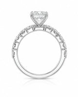 Luxury platinum pear cut moissanite ring with luminous side stones and elegant balance | SARATTI