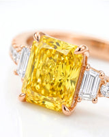 Luxury radiant sapphire ring with trapezoid diamonds in polished 18K rose gold | SARATTI