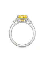 Luxury radiant sapphire ring with trapezoid diamonds in polished 18K white gold | SARATTI
