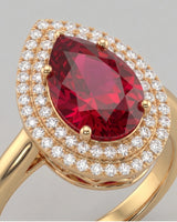 Luxury red-pink tourmaline ring with pear shape and diamonds in 18K yellow gold | SARATTI