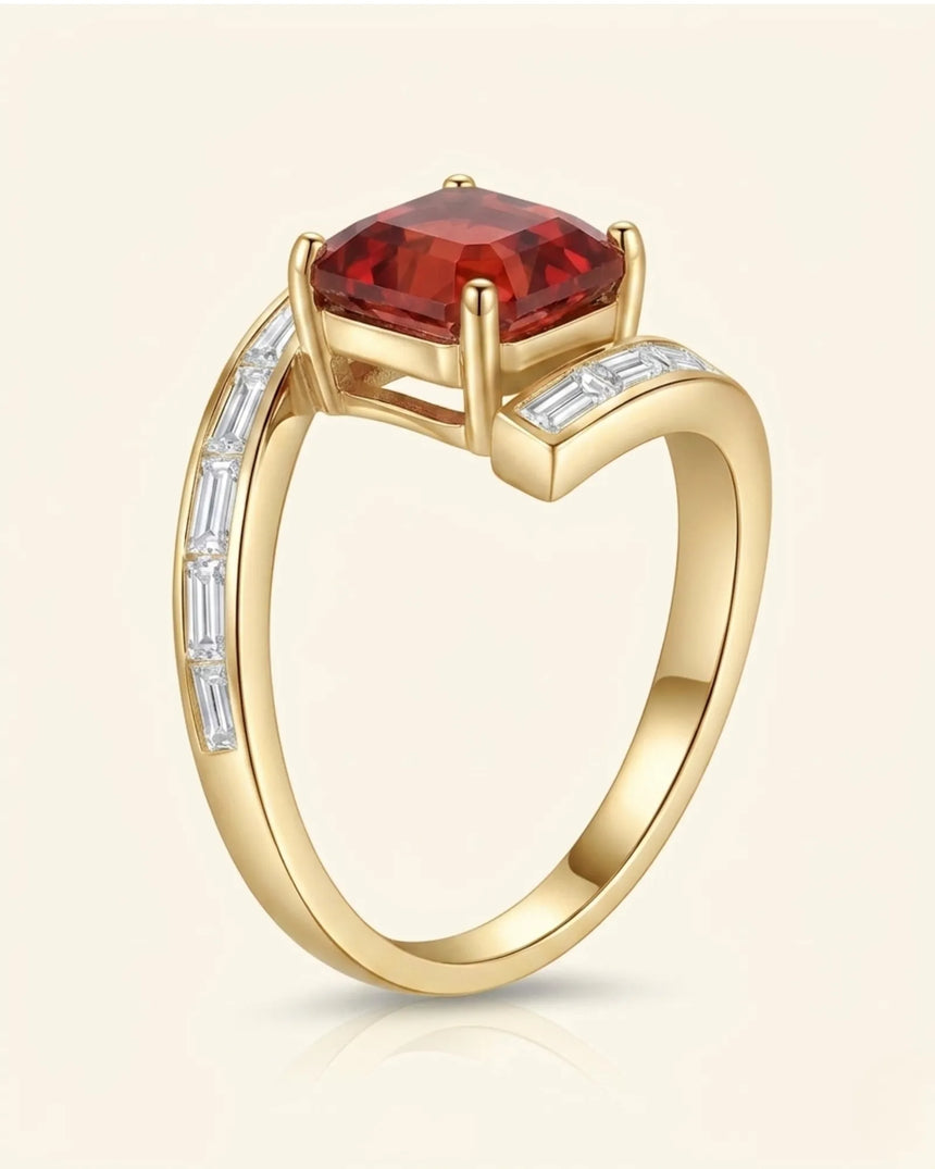 Luxury reddish pink tourmaline and diamond ring in yellow gold with modern bypass design | SARATTI