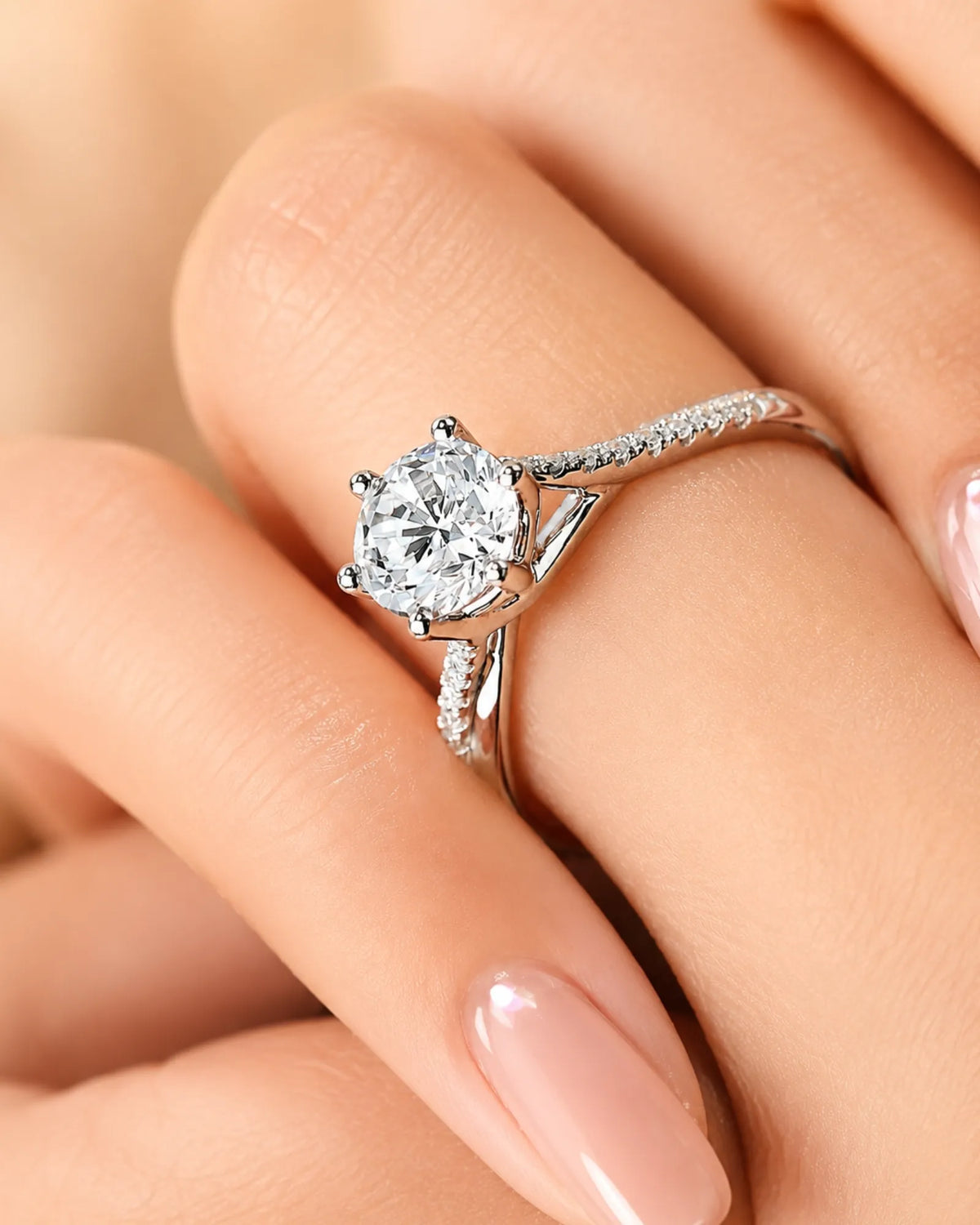 Luxury round diamond ring with refined split shank and timeless platinum brilliance | SARATTI