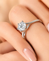 Luxury round diamond ring with refined split shank and timeless platinum brilliance | SARATTI
