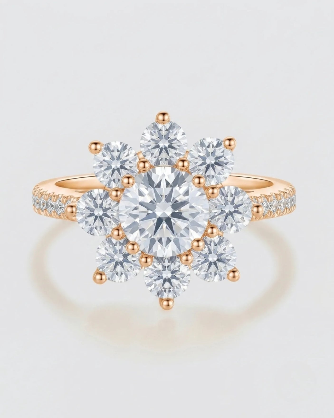 Luxury round moissanite ring with flower-inspired cluster and refined 18K rose gold craftsmanship - SARATTI