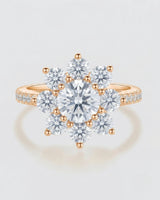 Luxury round moissanite ring with flower-inspired cluster and refined 18K rose gold craftsmanship - SARATTI