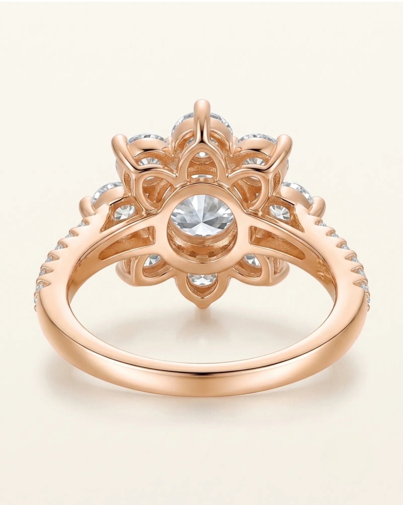 Luxury round moissanite ring with flower-inspired cluster and refined 18K rose gold craftsmanship | SARATTI