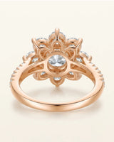 Luxury round moissanite ring with flower-inspired cluster and refined 18K rose gold craftsmanship | SARATTI