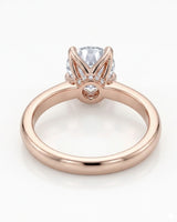 Luxury round moissanite ring with hidden pavé detail and soft rose gold setting - SARATTI