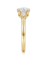 Luxury round moissanite ring with open gallery and rich yellow gold band | SARATTI